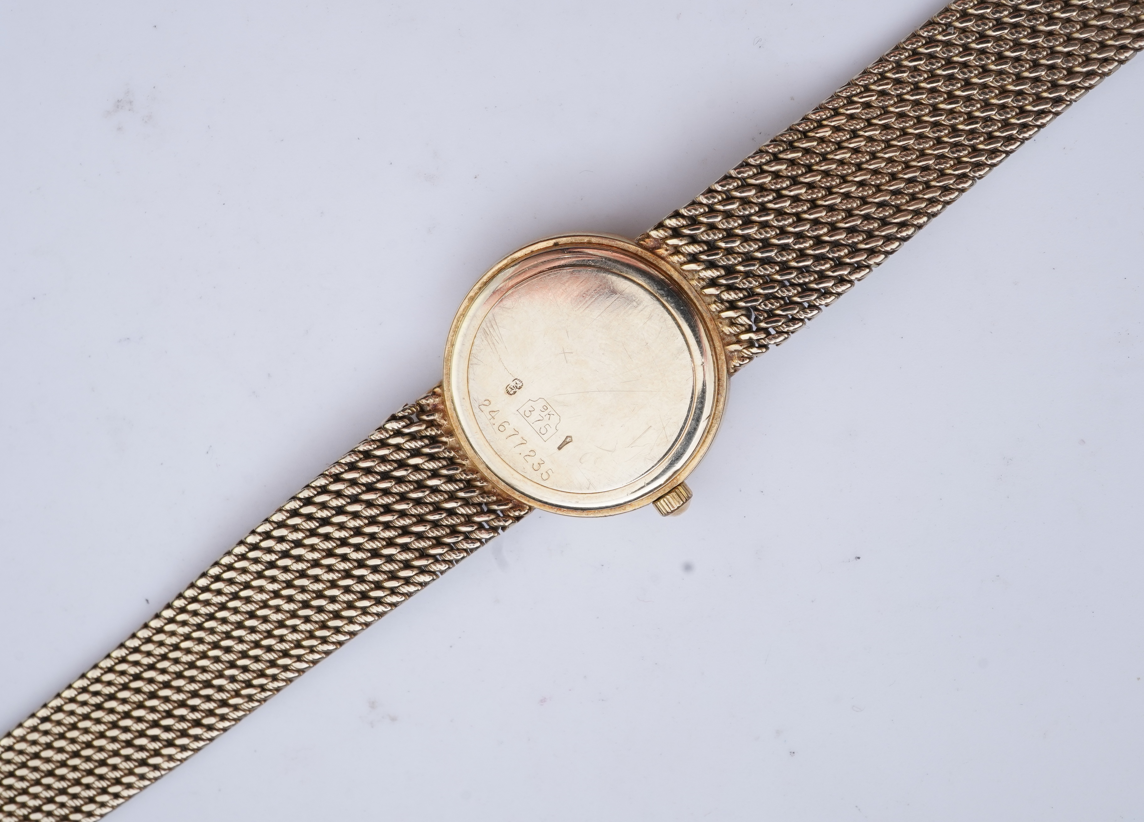 Longines, a gold watch